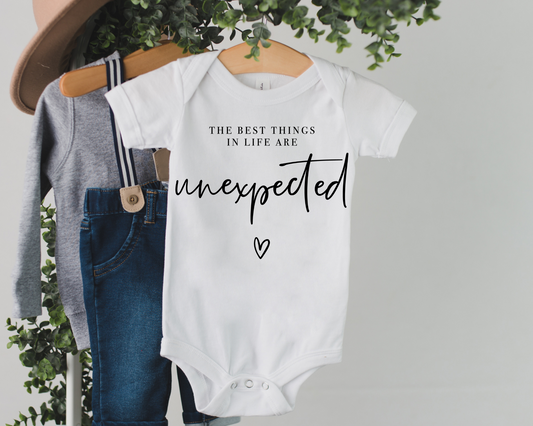 Unexpected Cursive Onesie®