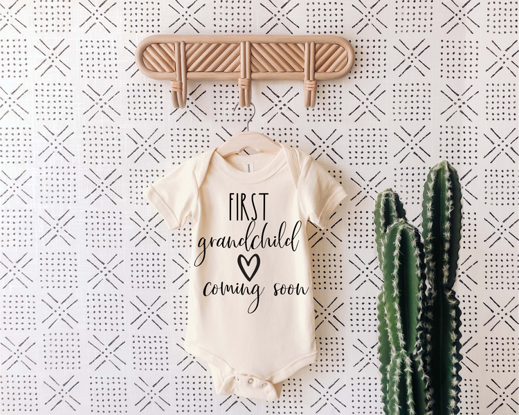 First Grandchild Coming Soon Heart Onesie®