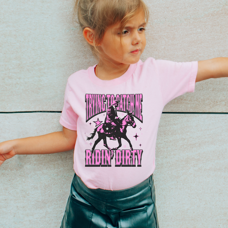 Trying To Catch Me Ridin Dirty Pink Kids Political Graphic Tee