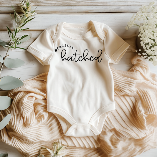 Freshly Hatched Cursive Onesie®