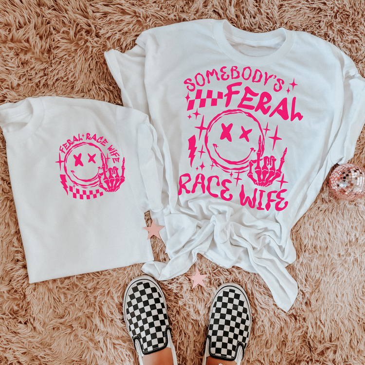 Somebody's Feral Race Wife Pink Writing Graphic Tee